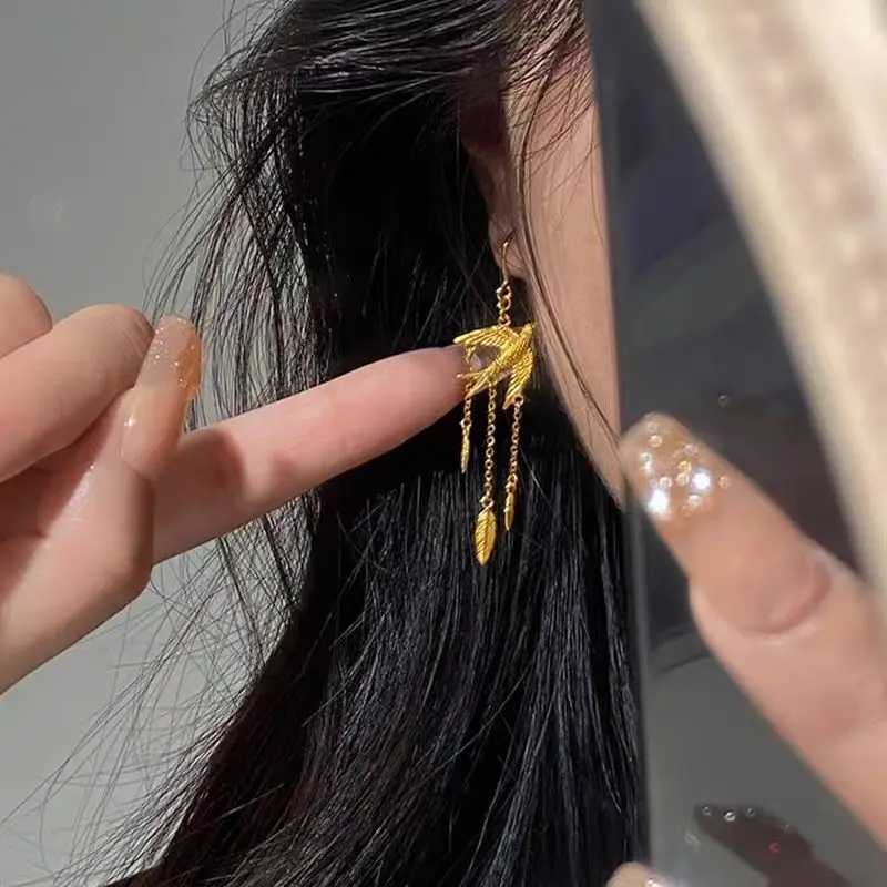 

Women's Fish & Swallow Earrings, 24K Gold, AU999 | "Stability" engraving with wave motifs, subtle professional elegance.