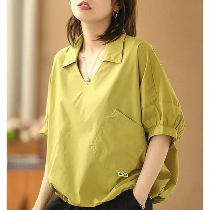 Fashion Solid Color Pockets Folds Asymmetrical Blouse Women\'s Clothing 2023 Autumn New Casual Pullovers All-match Commute Shirt