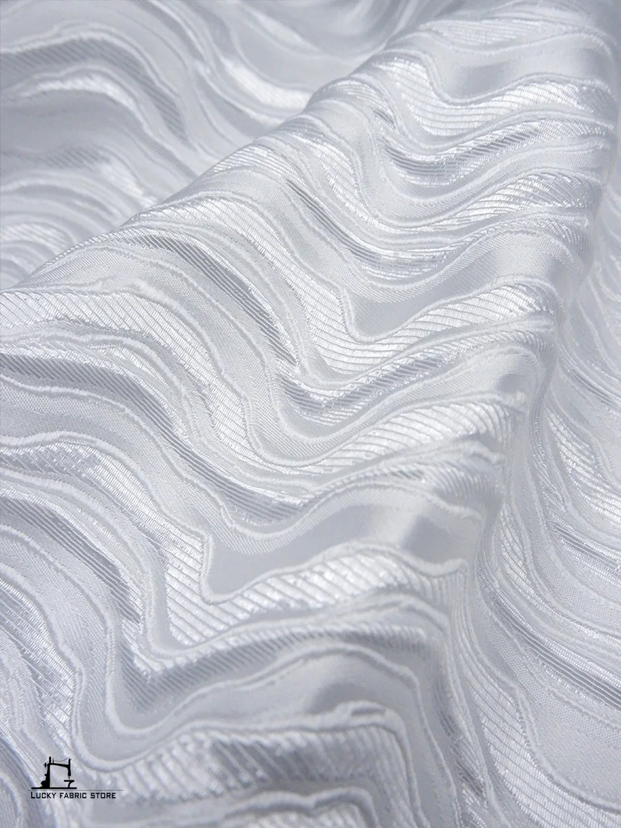 White wavy water pattern three-dimensional embossed texture gown autumn and winter jacket jacquard designer fabric