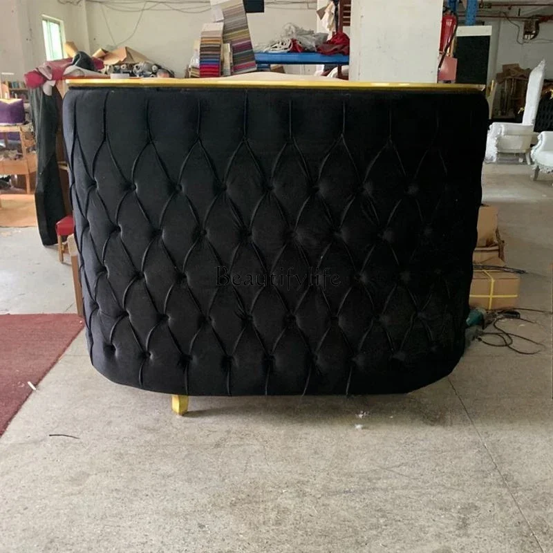 Black and gold beauty salon checkout page bridal shop company curved paint reception desk