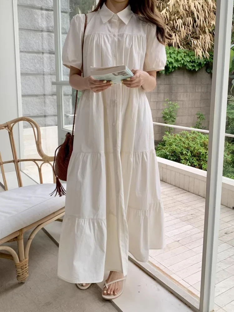 Vestido longo f de verão 2024, foado, com mangas bufantes, design com fendas, e, com botão único, saia em cam...