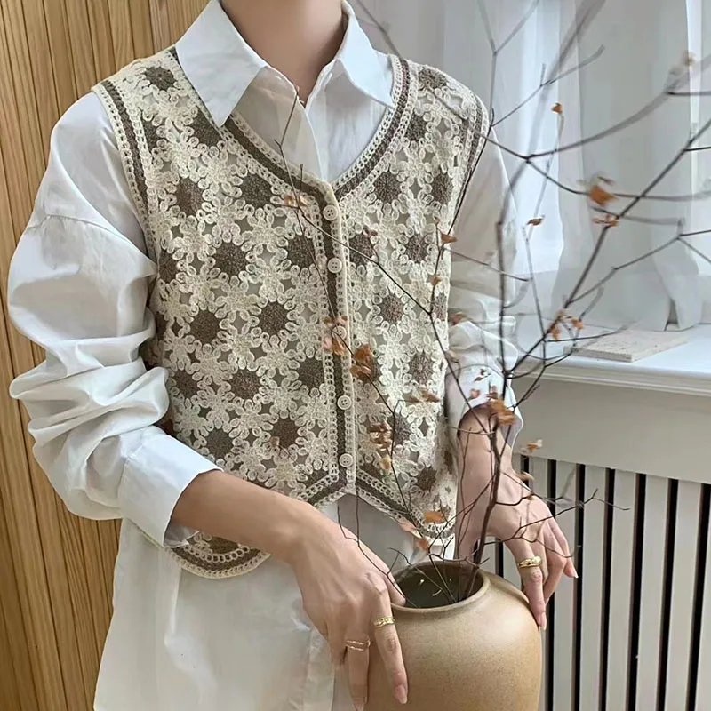 退屈なハニーレトロ中空アウトベストクロップトップ V ネックかぎ針編みノースリーブ女性の Tシャツシングルブレストファッション女性ブラウス