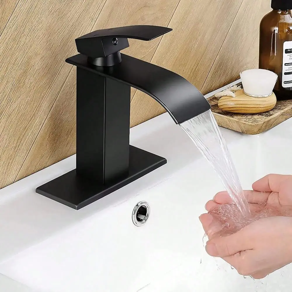

Black single-handle stainless steel bathroom basin faucet, includes 6-inch countertop base and hose, excludes pop-up drain.