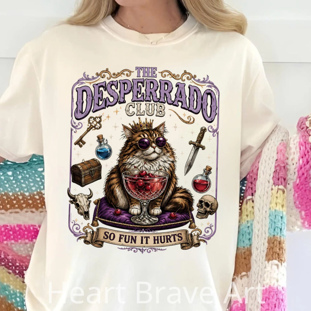 Desperado Club Cat Cocktail Tee Princess Donut Dirty Shirley Club Tee Dungeon Crawler Carl Mongo Ride or Roar Tee Achievement