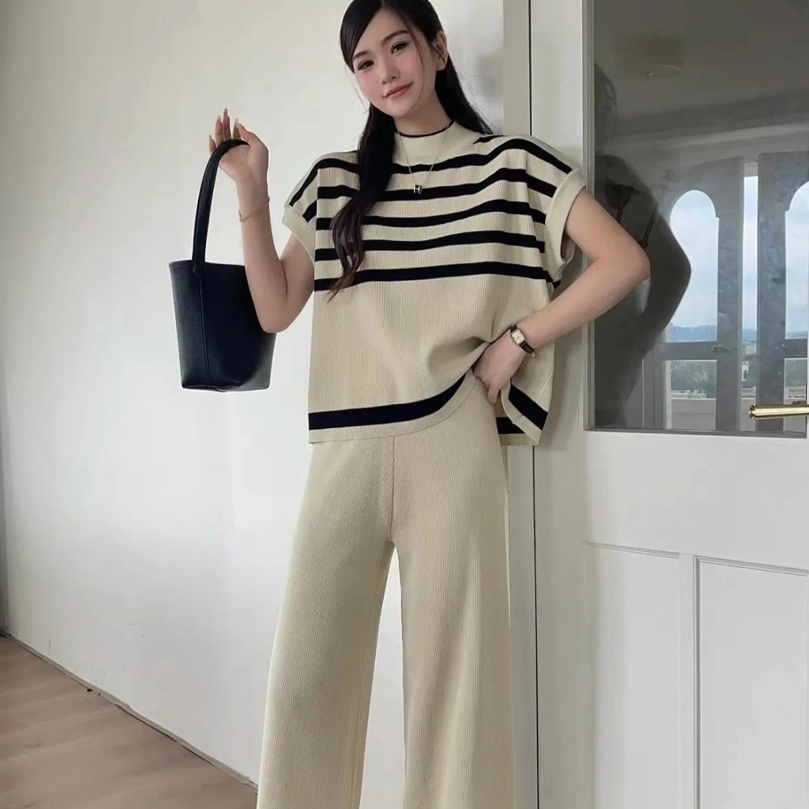 

Women's clothing set 2025 simple high niche striped knitted shoulder fashion slim fit wide leg pants two-piece set