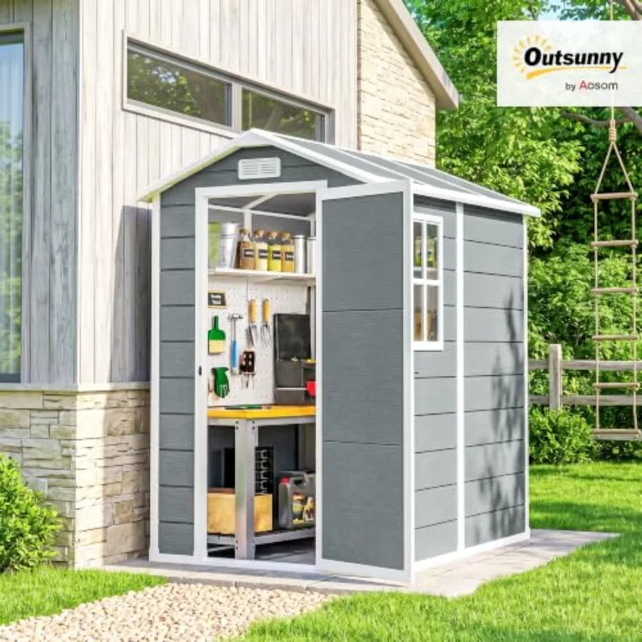 Outdoor storage shed for backyard use, waterproof resin material, gray color, includes floor and weather-resistant design