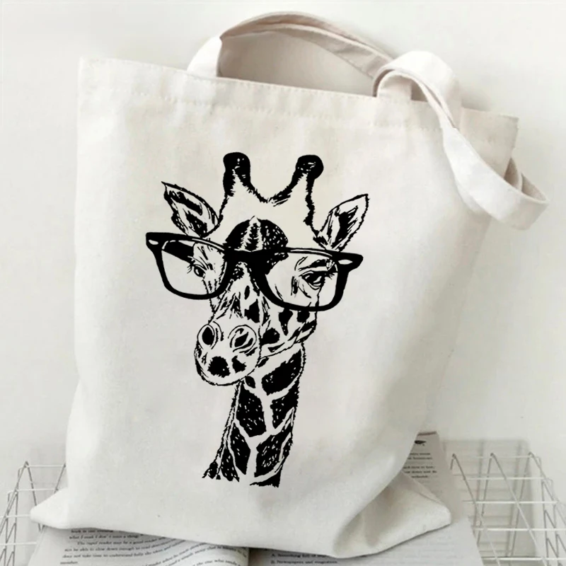 Bolsos de mano con patrón de jirafa para mujer, bolso de hombro de lona, gafas divertidas, diseñador Unisex, amantes de la jirafa, regalos, bolsas de almacenamiento versátiles