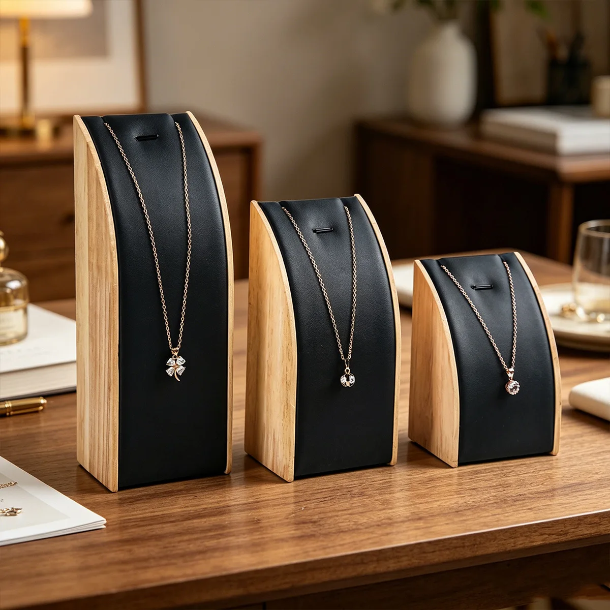 

Directly from the manufacturer, log curved necklace rack, black leather pendant display seat, jewelry shooting display props