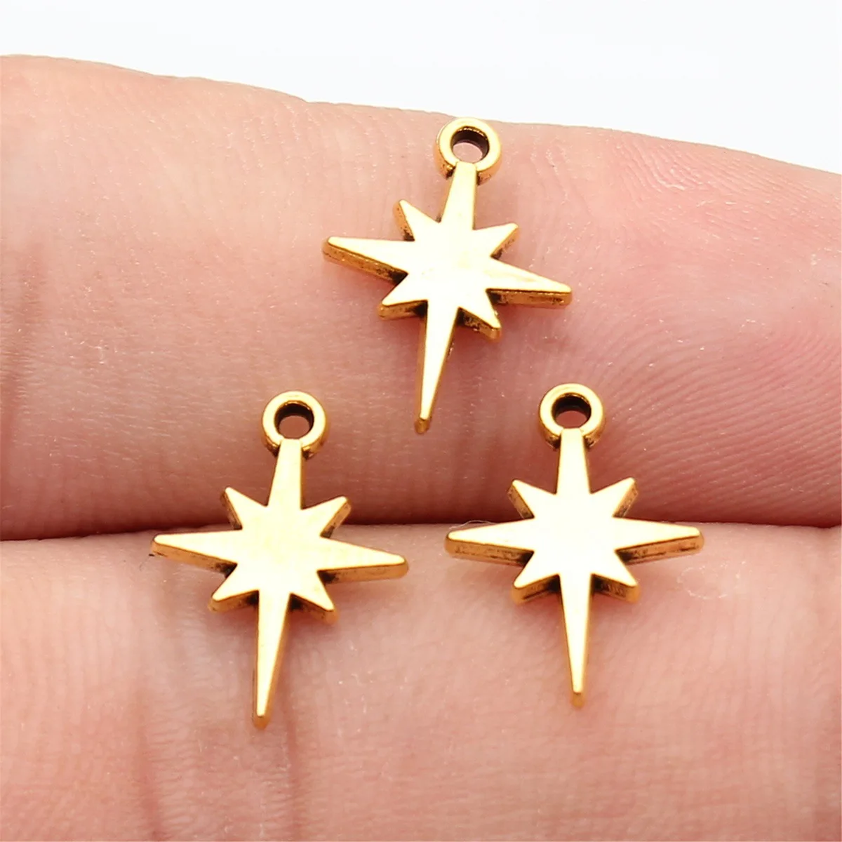 80pcs 15x11mm(0.59x0.43inch) 3 Colors Antique Gold Color Antique Silver Color Rhodium Color Starburst Star Charms Pendants
