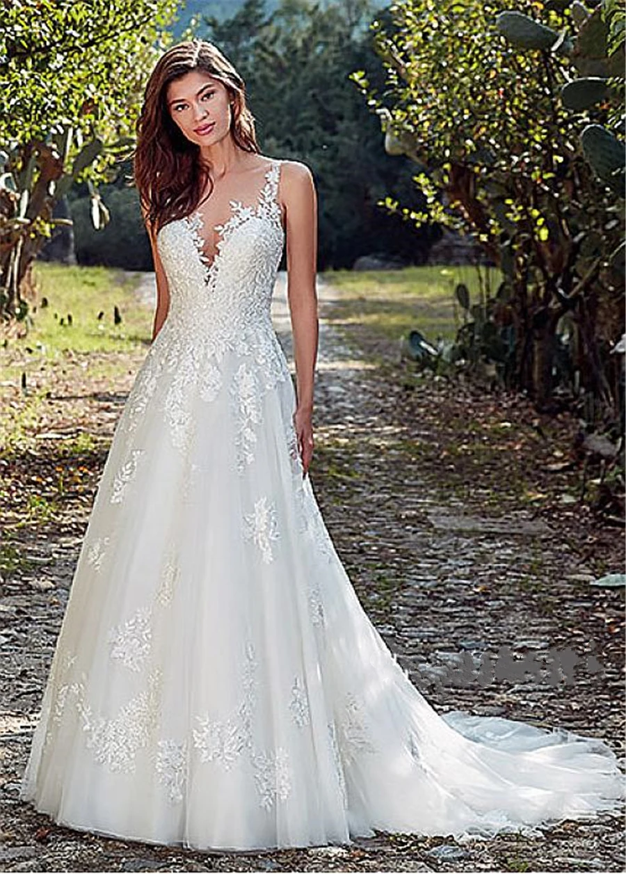 Vestido de novia de línea a con escote de Joya de tul, con apliques de encaje y abalorios, espalda abierta