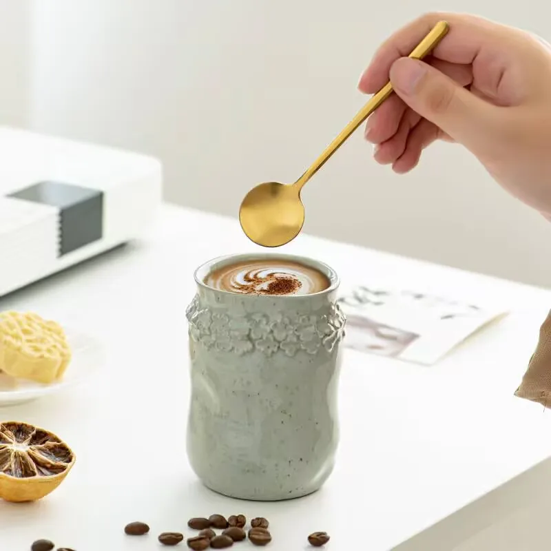 

Japanese retro embossed flowers and cherry blossoms ceramic cups bar design exquisite coffee cups thick pottery hand-held water