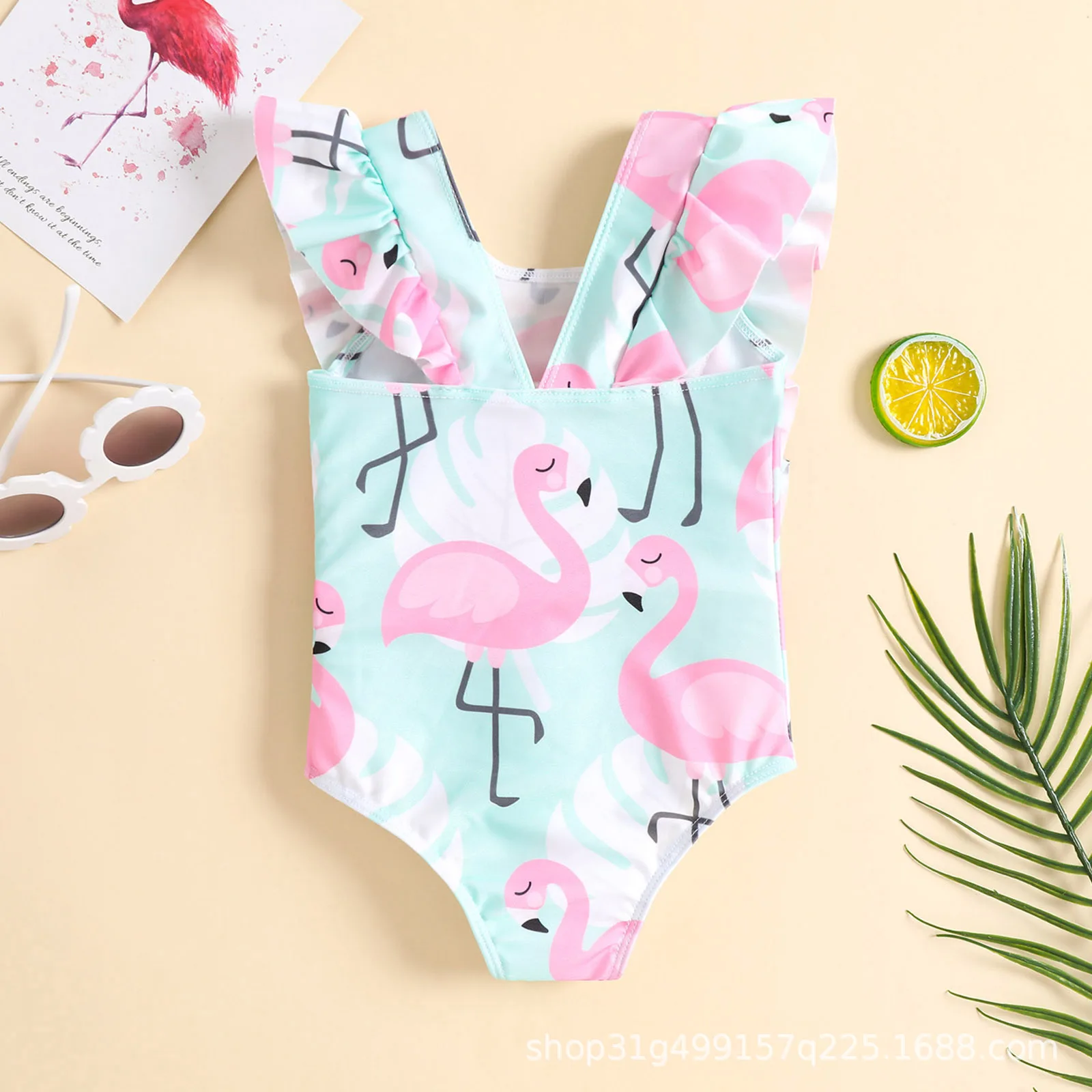 Baby one piece swimsuit with full print flamingo pattern and side ruffle decoration,suitable for pool play and seaside vacation