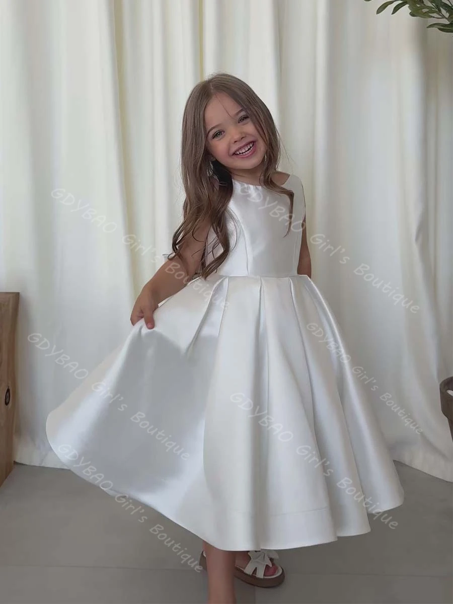 Vestido de niña de flores de satén blanco, vestido de novia de dama de honor con tirantes finos y lazo hasta el té, vestido de fiesta de comunión personalizado