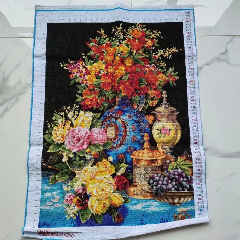 Handmade cross stitch finished product with a cluster of European style still life oil paintings, vases, living room, dining