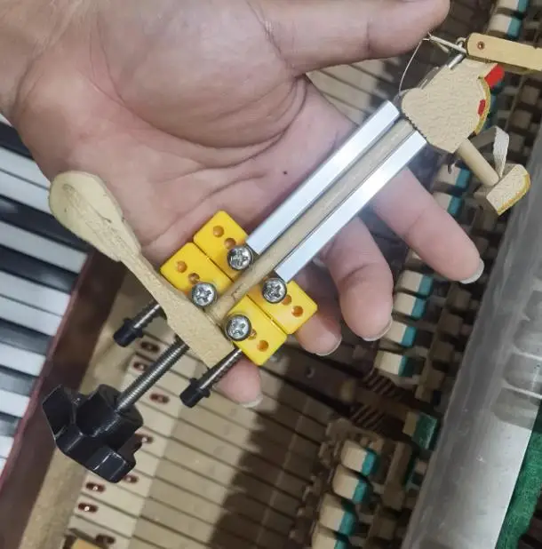 Hammer remover/piano tuning maintenance tool