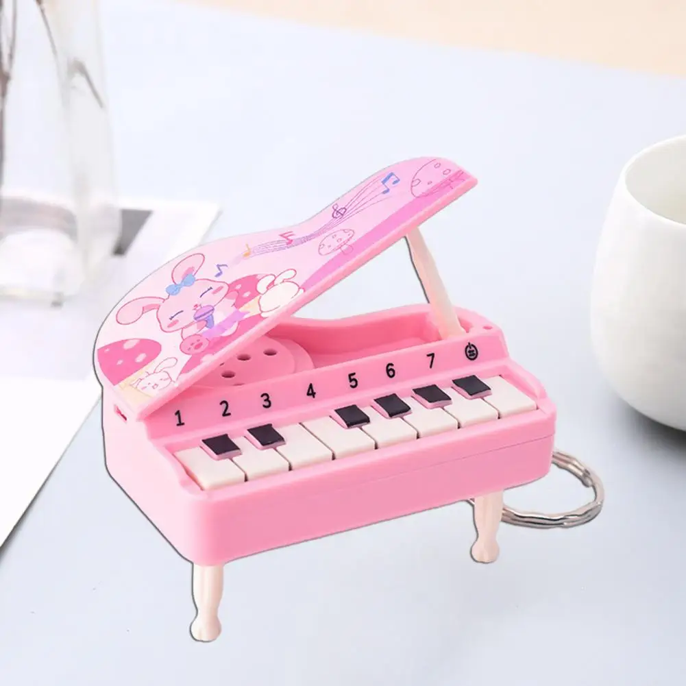 Piano-themed Boredom Buster Interactive Mini Electronic Piano Toy for Kids with Portable Bag Decoration Keychain Keyring Working