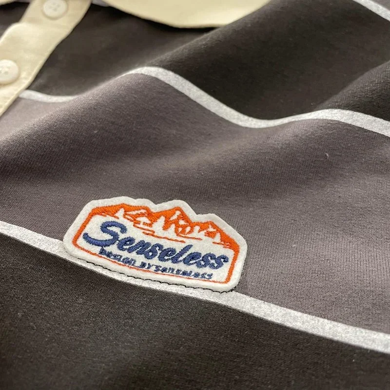 女性のレトロなストライプのTシャツ,原宿のカジュアルな長袖ブラウス,プレッピーのTシャツ,ヒップホップのカップルのための特大のスウェットシャツ
