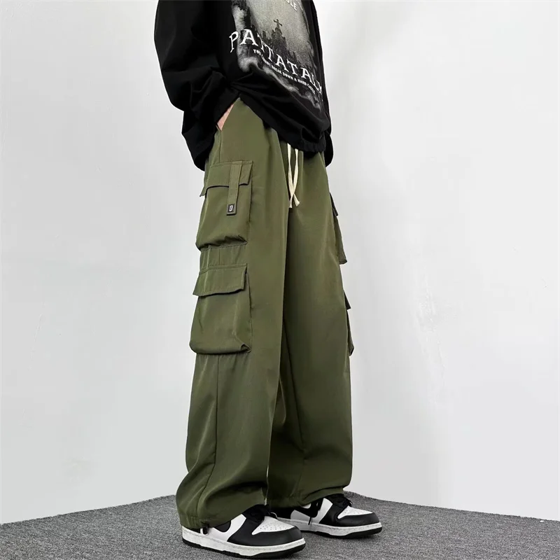 

2024 Men Outdoor Multiple Pockets Cargo Pants Spring Casual Drawstring Baggy Wide-leg Trousers Hip Hop Fashion Pantalones