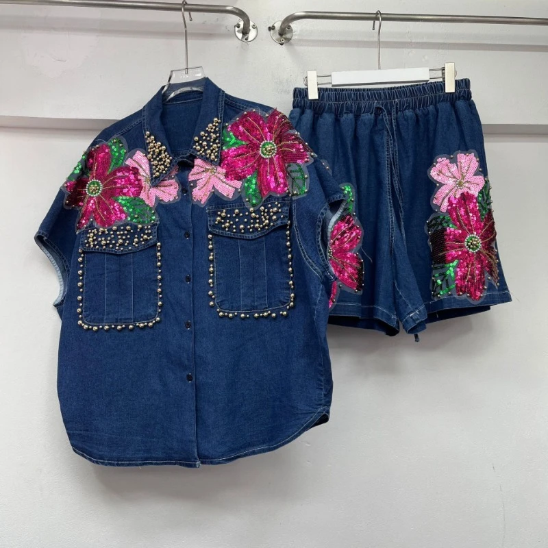 ユニークなデザインの女性のルーズ半袖シャツ新しい夏ヨーロッパ重工業ファッションワイドレッグショーツデニムジャケット 2 個セット