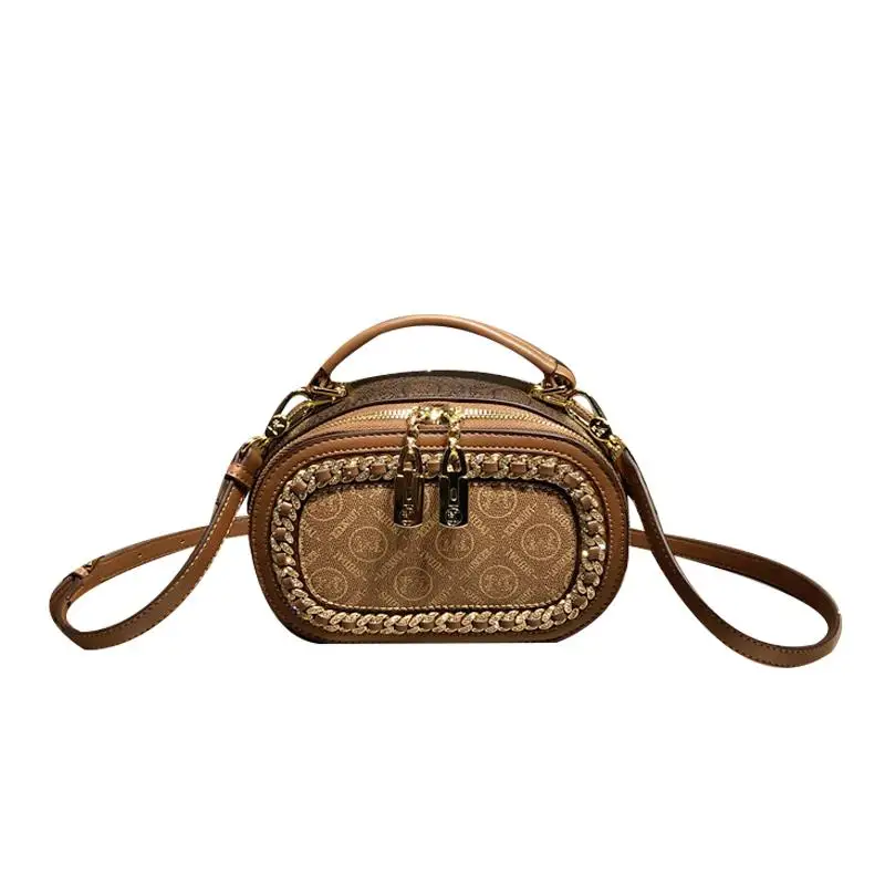 

Гонконгская брендовая женская кожаная сумка, новинка 2025 года, маленькая круглая сумка на одно плечо, модная высококачественная сенсорная сумка