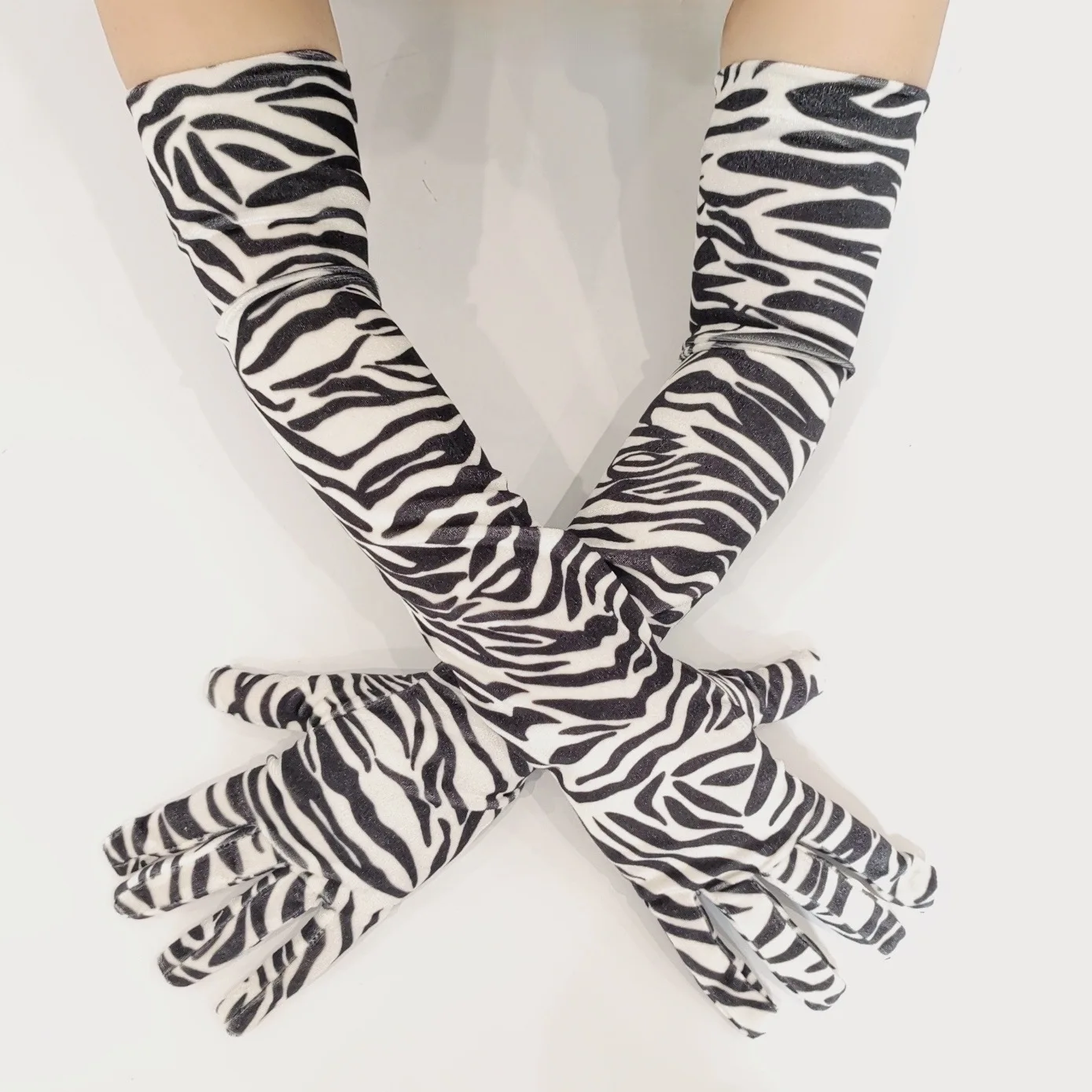 Long, warm velvet formal gloves for autumn/winter—perfect for balls, performances, and parties; featuring a zebra-print design.