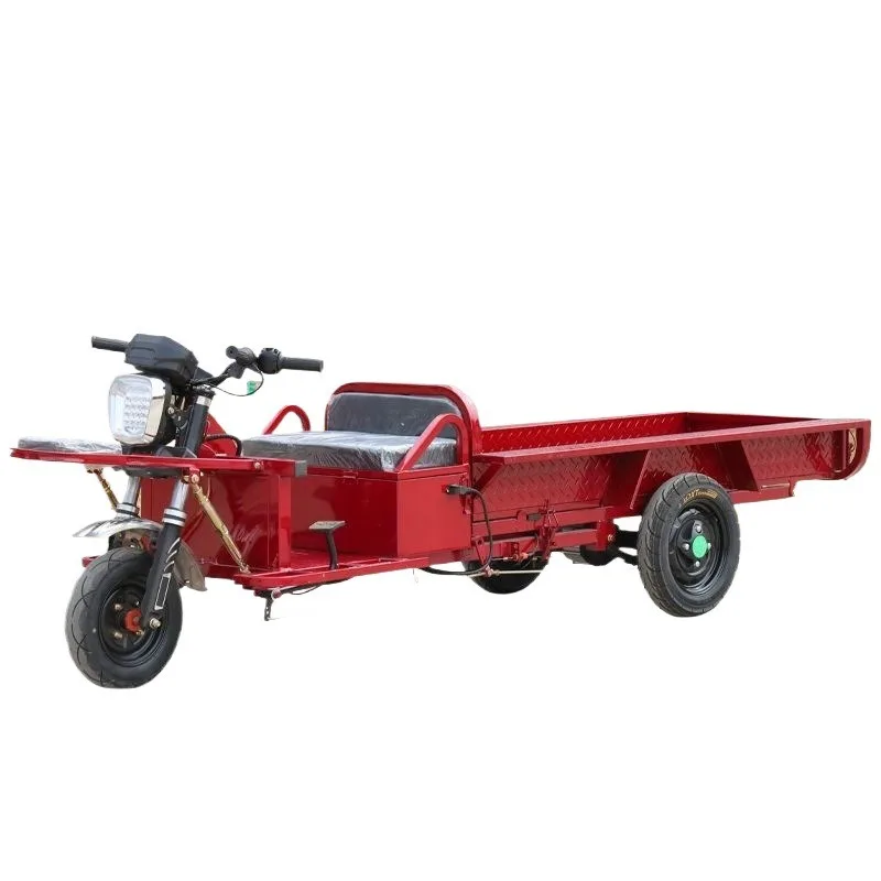 The transport vehicle has a low chassis and is riding upside down, an electric tricycle for night market stalls