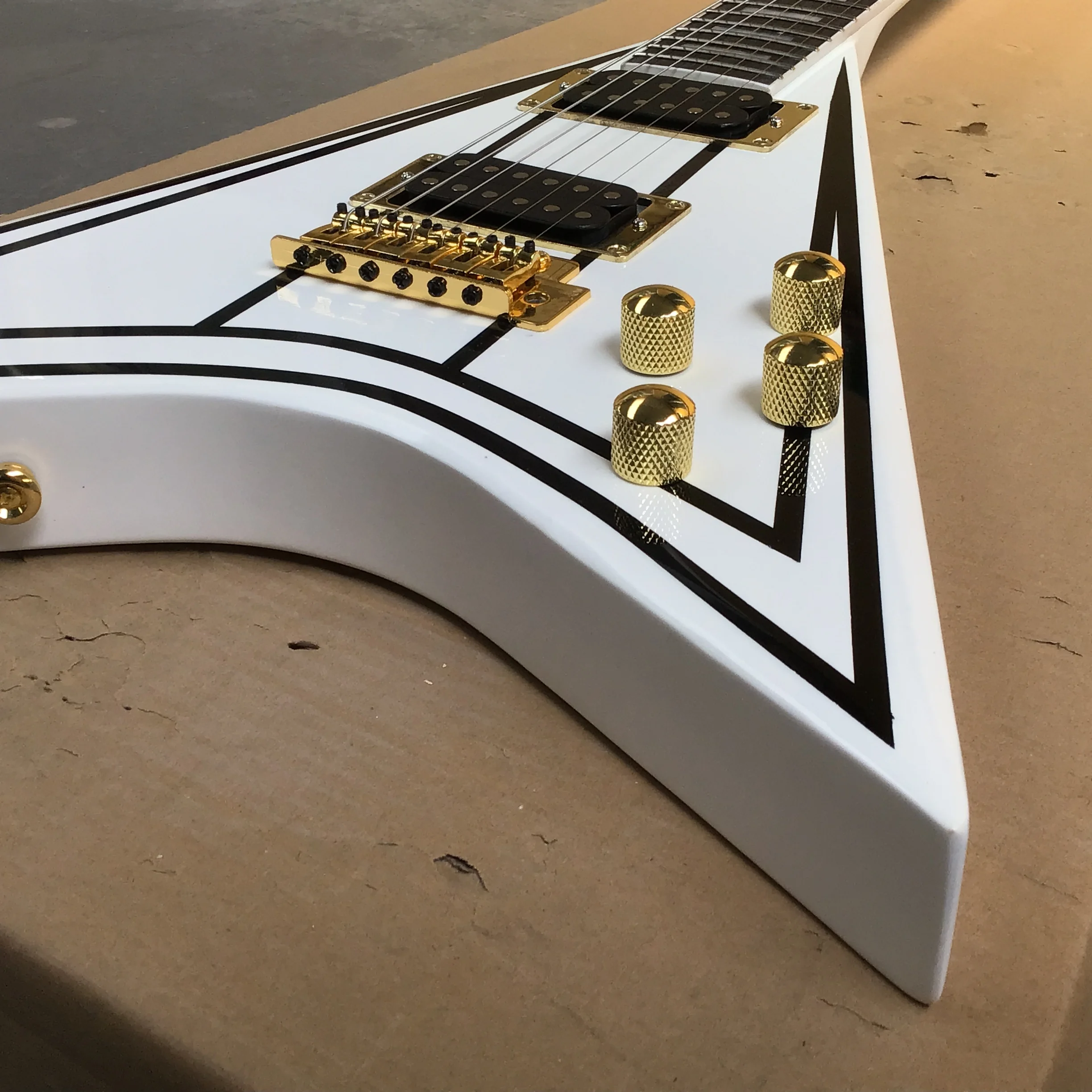 Irregular fork style 6-string integrated electric guitar,white with gold, Perfect tone,hot sales in stock ,customizable,22F，V