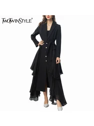 TWOTWINSTYLE Solid Spliced Sashes Asymmetrical Trenches For Women Lapel Long Sleeve Patchwork Button Temperament Coats Female