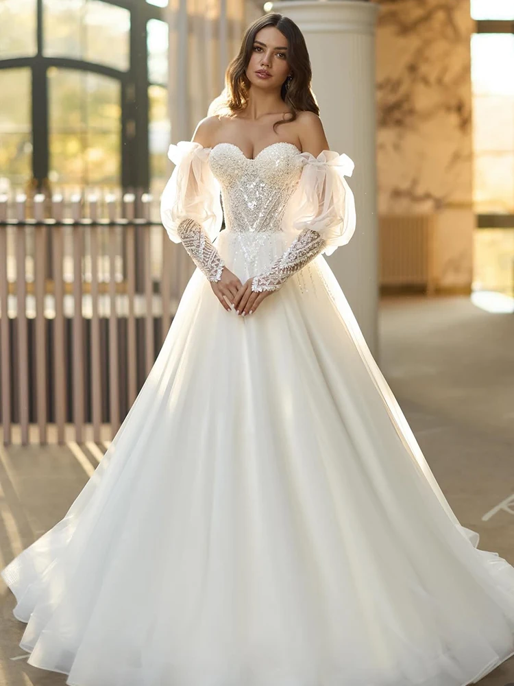 فستان زفاف أنيق من الأورجانزا مع ترتر مطرز على شكل حرف a بطول الأرض وأكمام منتفخة قابلة للفصل بدون حمالات حسب الطلب