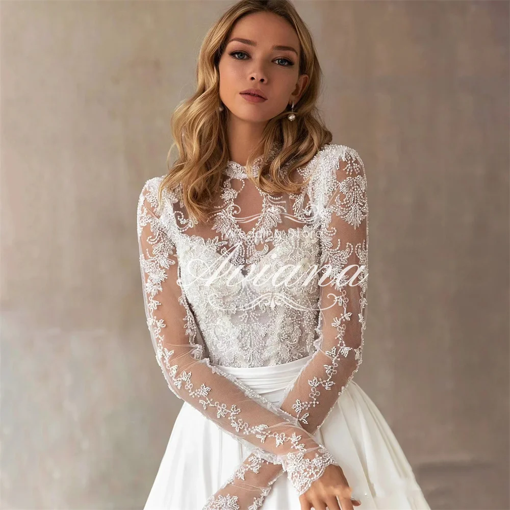 Aviana dostosowana suknia ślubna z wysokim dekoltem i długim rękawem koronkowa haftowana suknia ślubna satynowa spódnica eleganckie falbany nowy projekt linia A wysokiej jakości