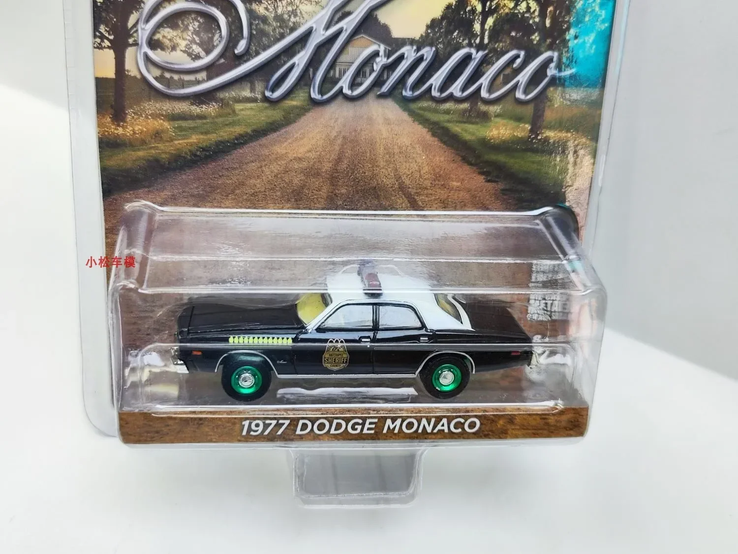 

Green Light 1:64 1977 Dodge Monaco - Hatchapee Dodge Mona Police Car Green Machine Edition