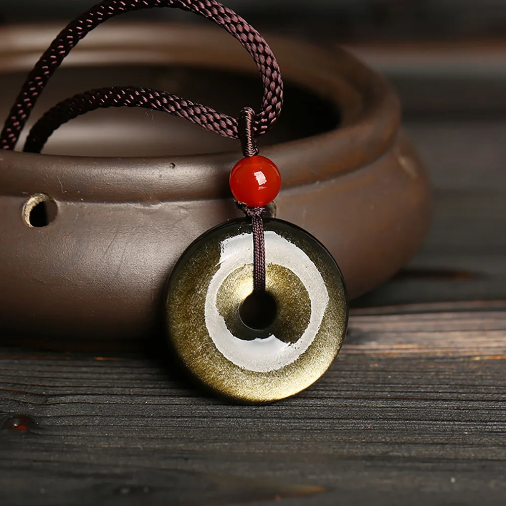 

Женский золотистый обсидиановый свитер с подвеской