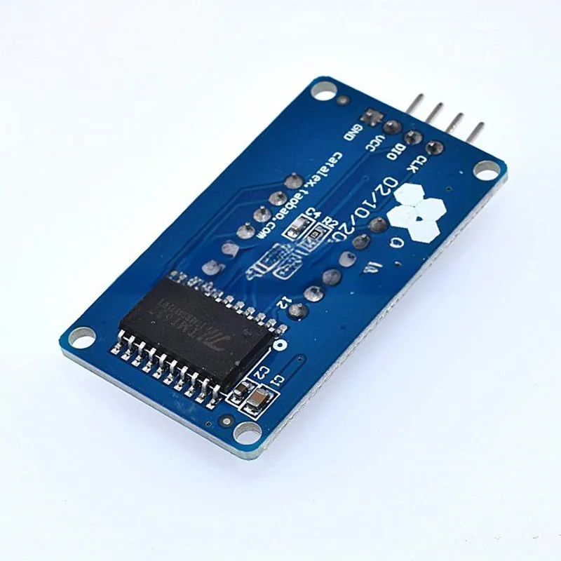 Modulo display a 4 bit a 7 segmenti con luminosità LED regolabile caratterizzato da un clock al colon TM1637 guidato per vasca digitale con anodo Arduino