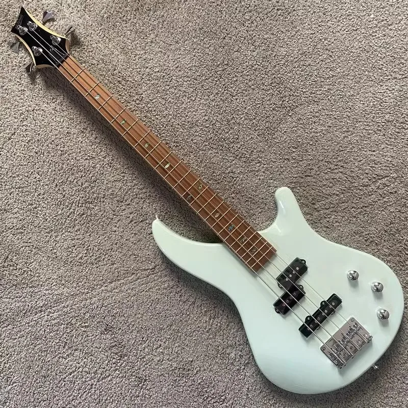 

Mitchell Short-Scale Children's Mini Electric Bass with PJ-Style Pickups by Guitar Center USA