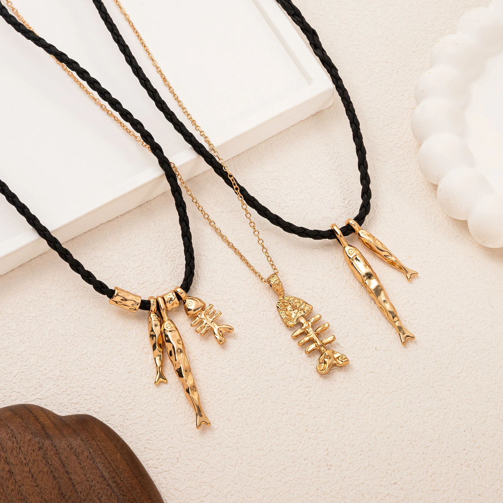 

Simple and stylish multi type black rope small fish pendant necklace with colorful lucky rope Necklaces for women