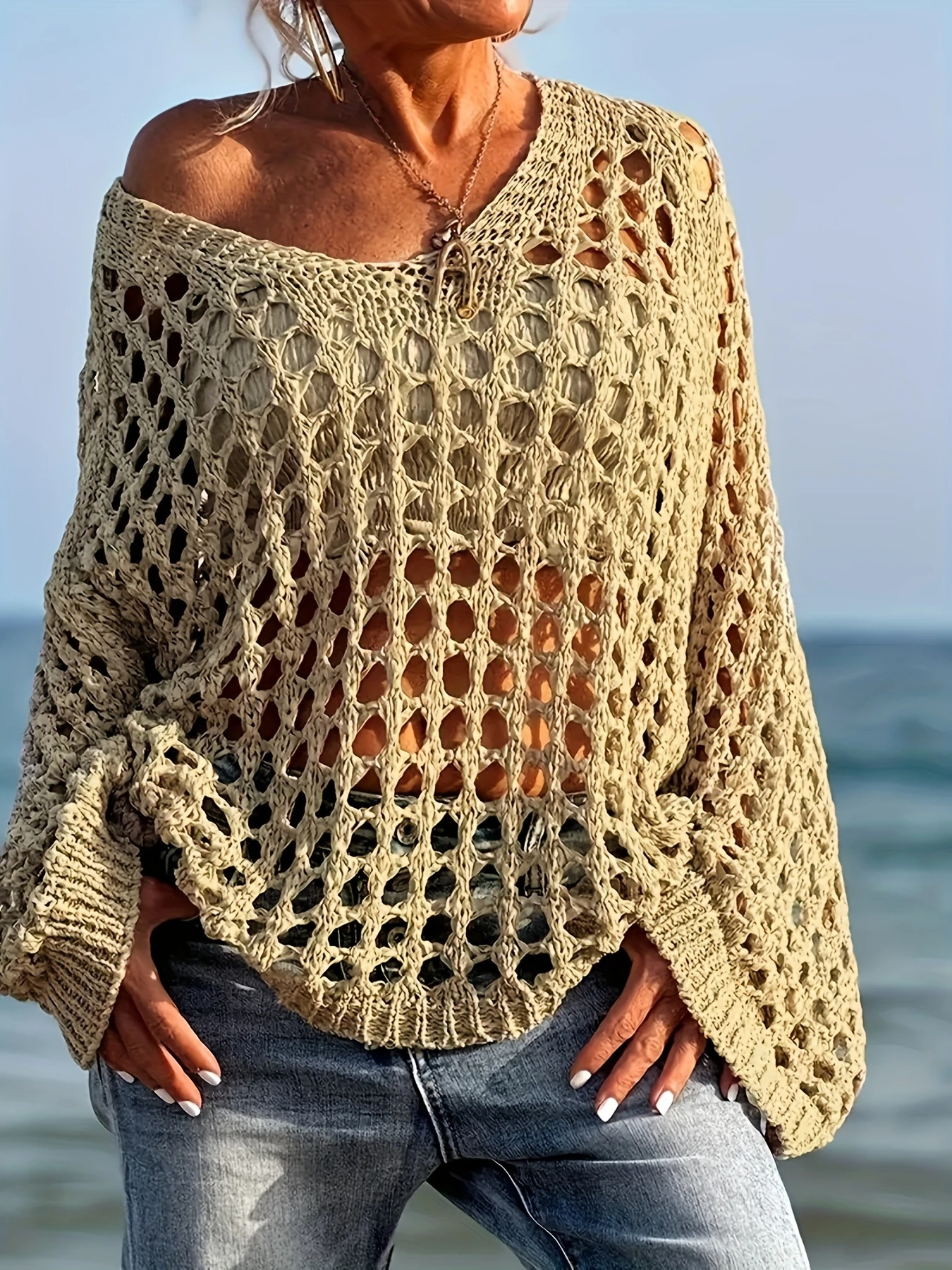 

Women's plus size hollowed out loose knit long sleeved pullover, fashionable and unique design, suitable for spring and summer