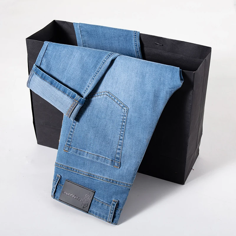 2026 New Brand Thin Material Men's Elastic Cotton Jeans Fashion Sky Blue Comfortable Denim Business Casual High Waist Pants