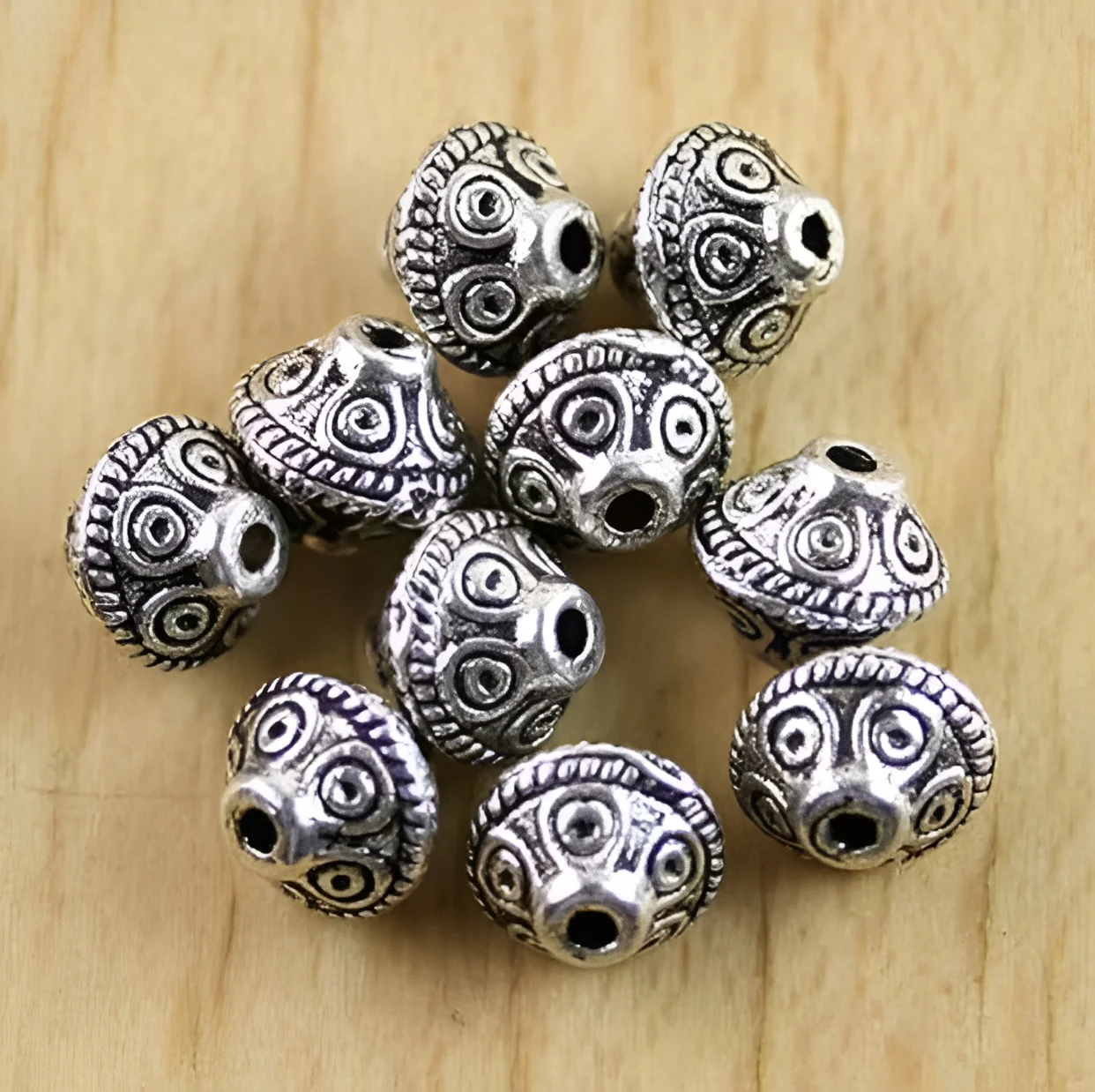 

30pcs 7x6mm,hole:1.2mm Alloy matel tibetan silver crafted textured spacer beads HWH0136