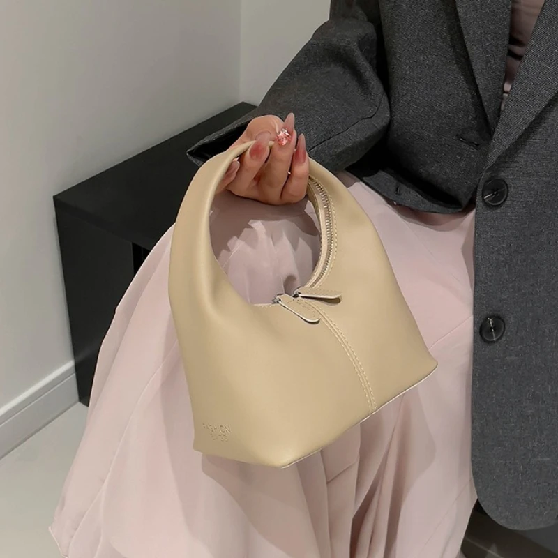 bolsa-hobo-minimalista-de-couro-com-alca-superior-curvada-integrada-elegante-bolsa-de-uso-diario-adequada-para-mulheres-em-deslocamentos-casuais