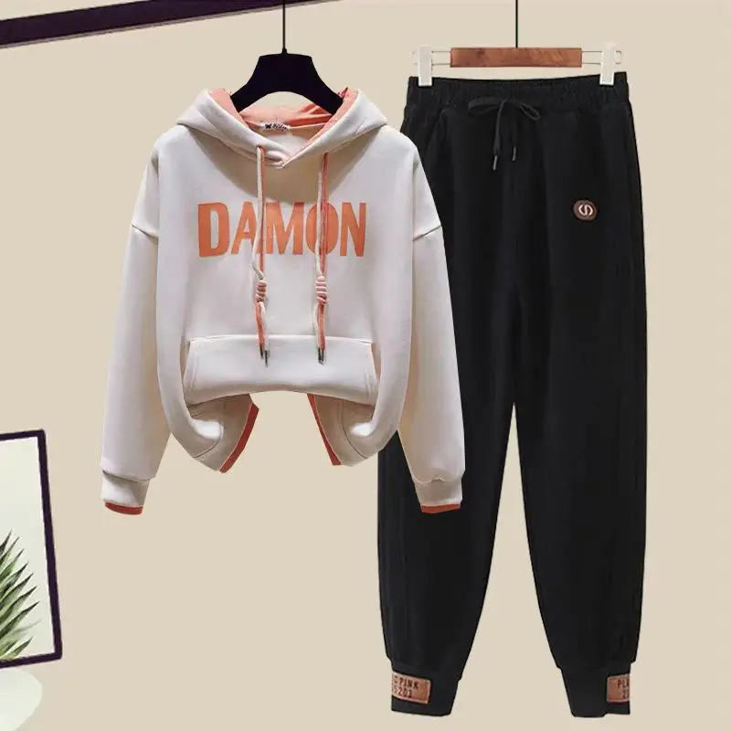 Lente-En Herfstset Nieuwe Mode-Tijdperk Voor Dames Met Minder Verlof Tweedelige Capuchon-Top Casual Sportbroek Tweedelige Set