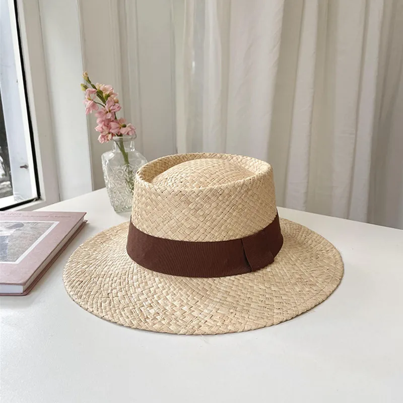 Pure hand-woven raffia flat cap simple fashion color ribbon women\'s hat outdoor beach travel sun hat wholesale spot