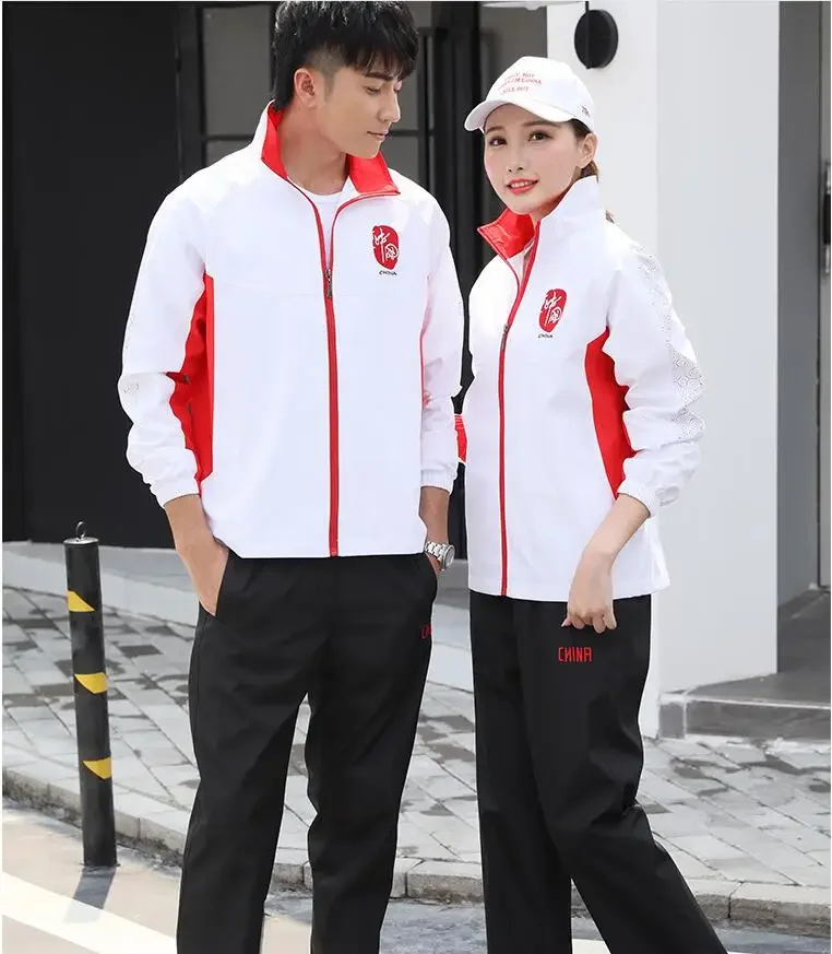 Uniforme sportiva della squadra nazionale cinese Manica lunga Abbigliamento sportivo autunnale Giochi Indumento di aspetto di gruppo per studenti e studentesse