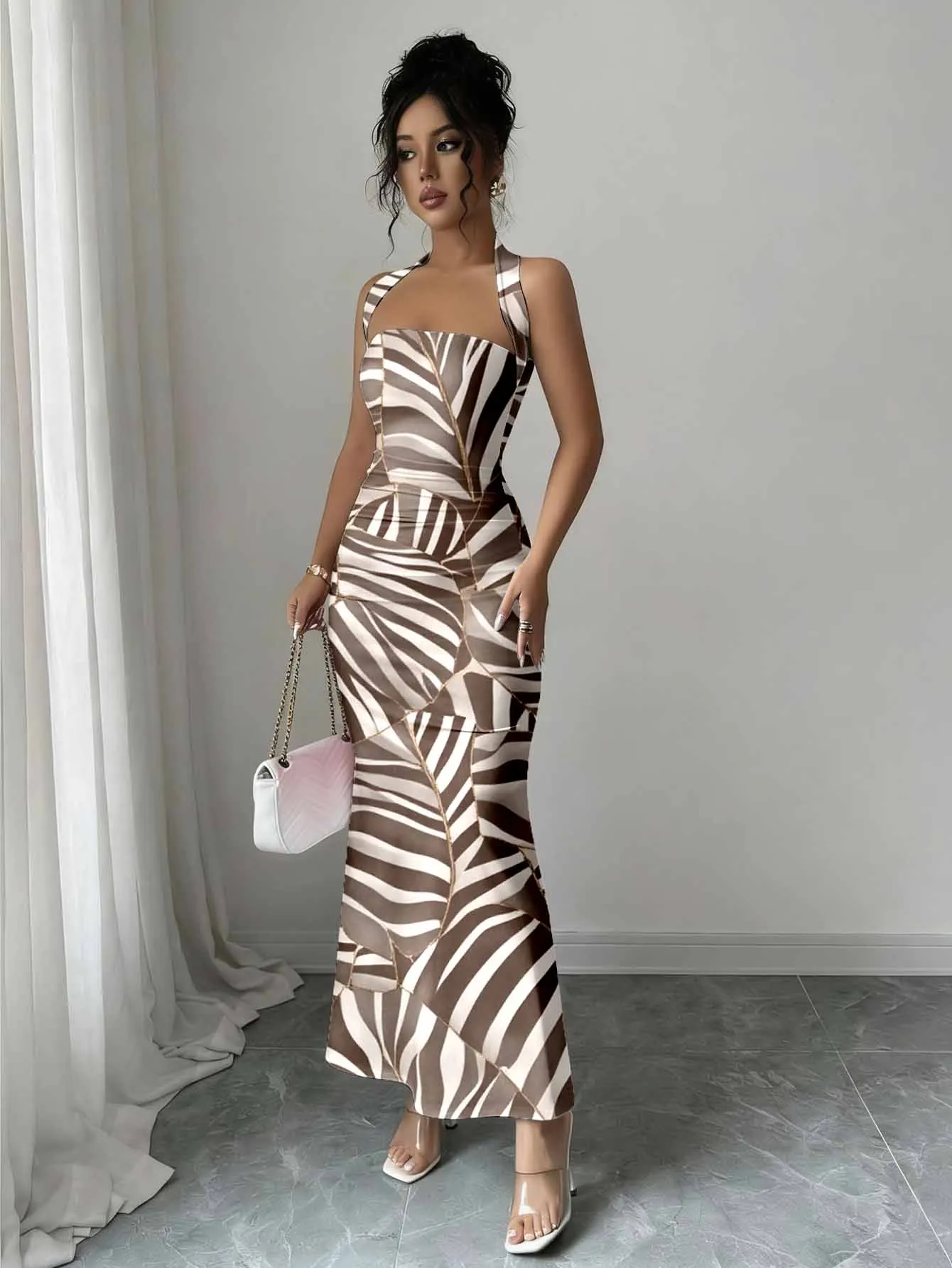 Women's neck-worn waist-tied dress with minimalist backless design for a refined feminine look