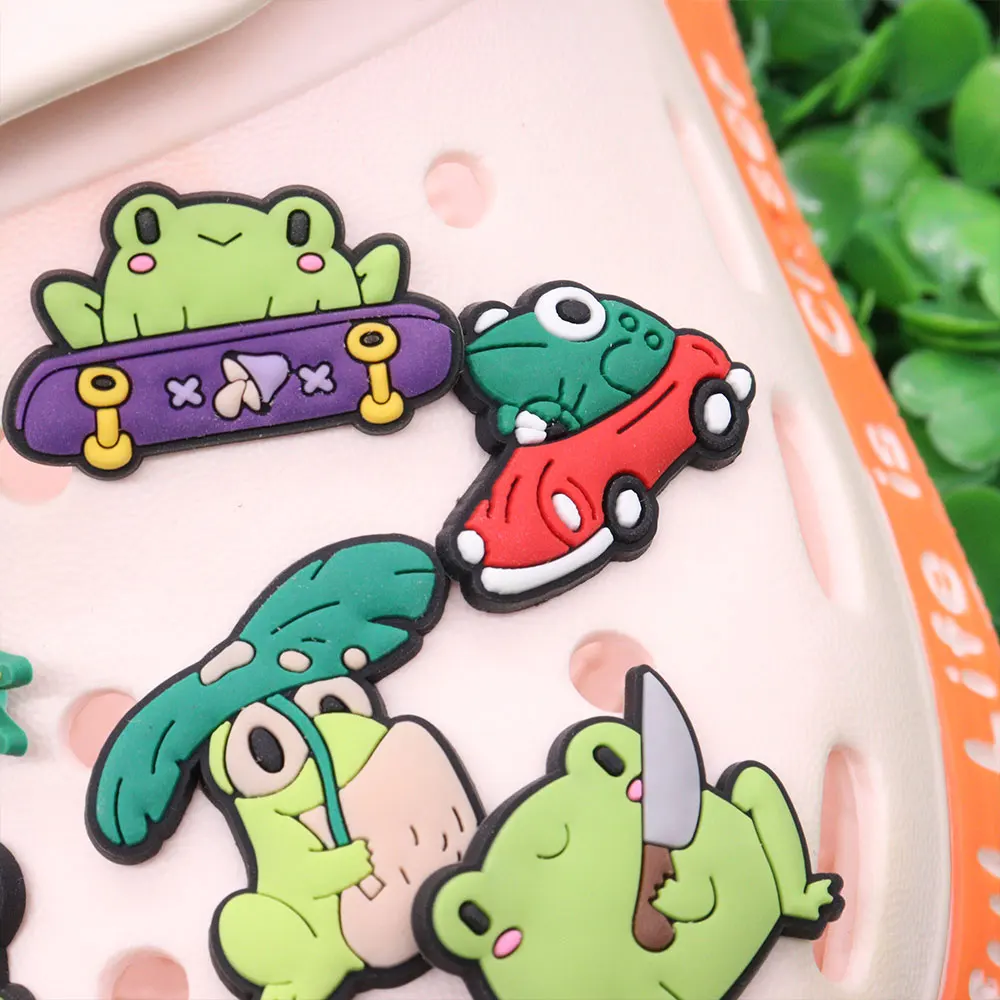 New Arrival 1pcs PVC Shoe Charms Fit Wristband Cartoon Frog Knives Bess Sandals Ornaments Hole Slipper Shoe Accessories Kid Gift