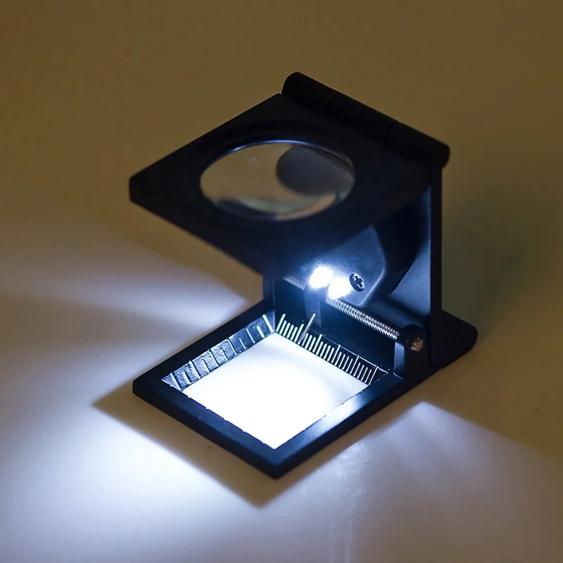 10X 28mm lupa biurkowy wspornik LED światło kalibracja z tworzywa sztucznego przenośna tkanina szkło powiększające gołębie oko wątek lupa o gęstości