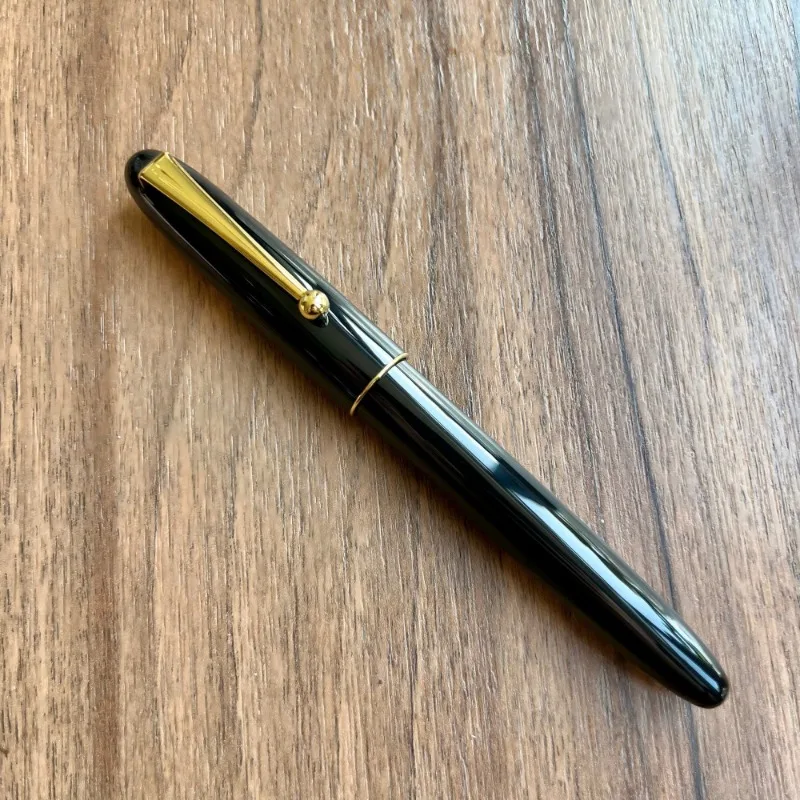 

Ручка со скидкой Guochen 163, черное золото, перьевые ручки с зажимом F 0,5 мм, изогнутое художественное перо, чернильная ручка, офисные письменные принадлежности, оптовая распродажа
