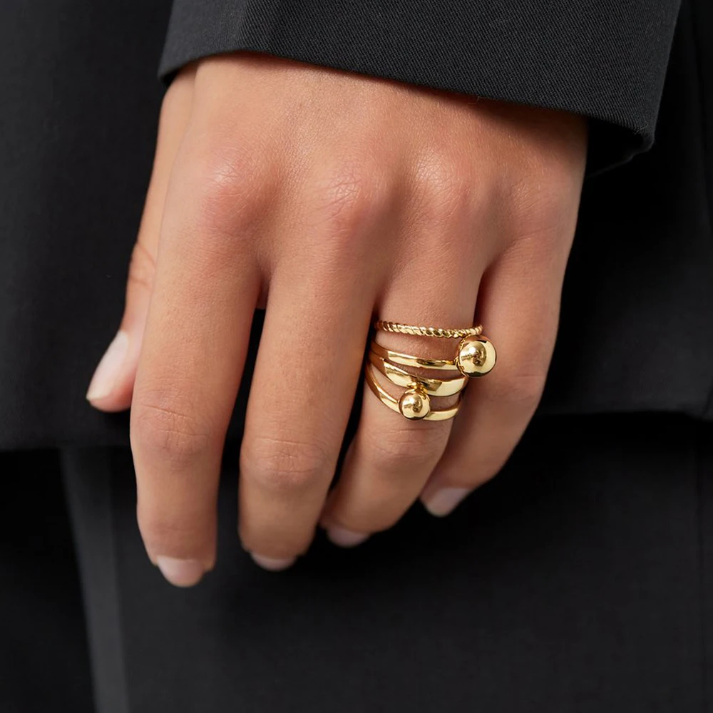 

AIKOER Minimalist 18K Gold Color Plated Stainless Steel Personalized Ball Multi Layer Hollow Ring Stackable Linear Ring Women's