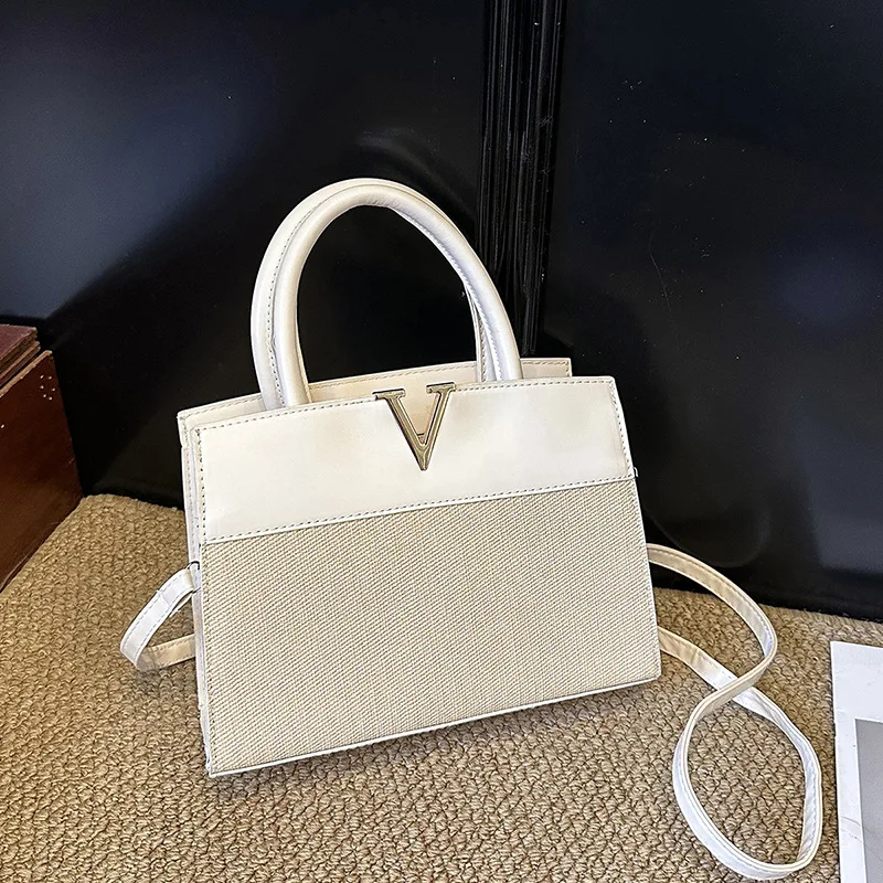 

Cross-border bags Women's niche high-end handbags Commuter to work Female temperament Versatile large-capacity messenger shoulder bag