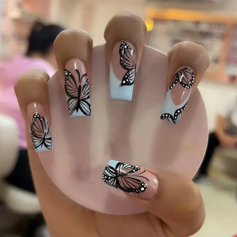 

24Pcs Long Coffin Press-on Nails: Pink Base with White Border & Black Butterflies - Instagram Edgy Style