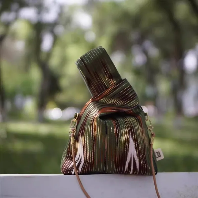 

Original Designer Handbag Woman New In High Quality Flash Striped Cotton Fabric Shoulder Bag Knotting Leather Rope Crossbody Bag
